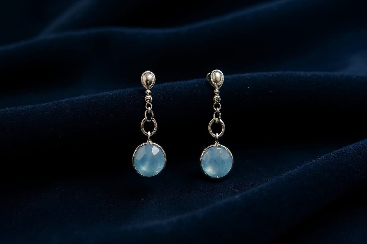 Saorla, Handmade jewellery on a warm editorial set, soft shadow and glinting metal